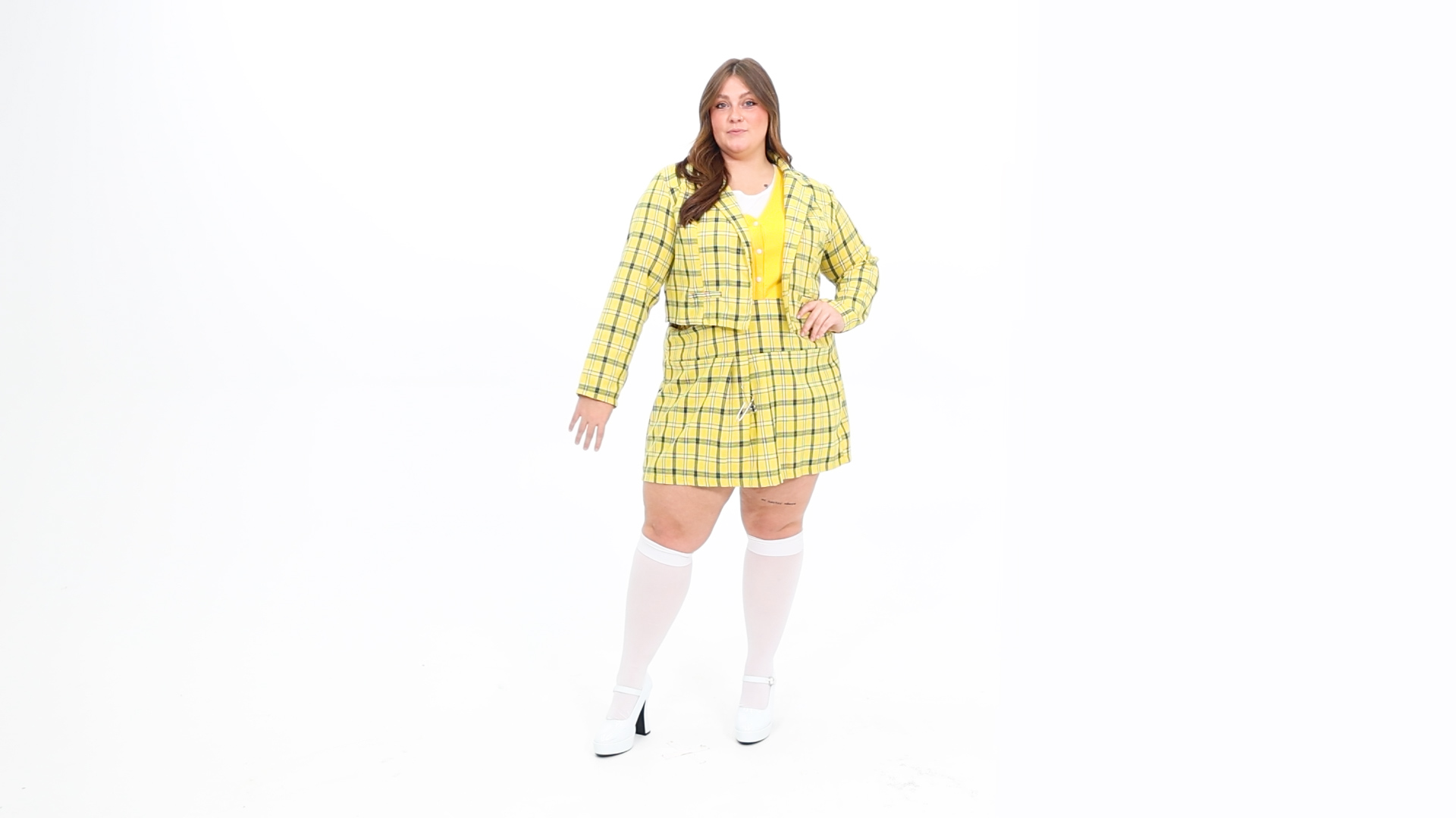 Channel your inner '90s fashionista with the Clueless Cher Plus Size Costume for Women! This stylish ensemble will have you feeling like the ultimate Beverly Hills teen, complete with Cher's iconic plaid look.